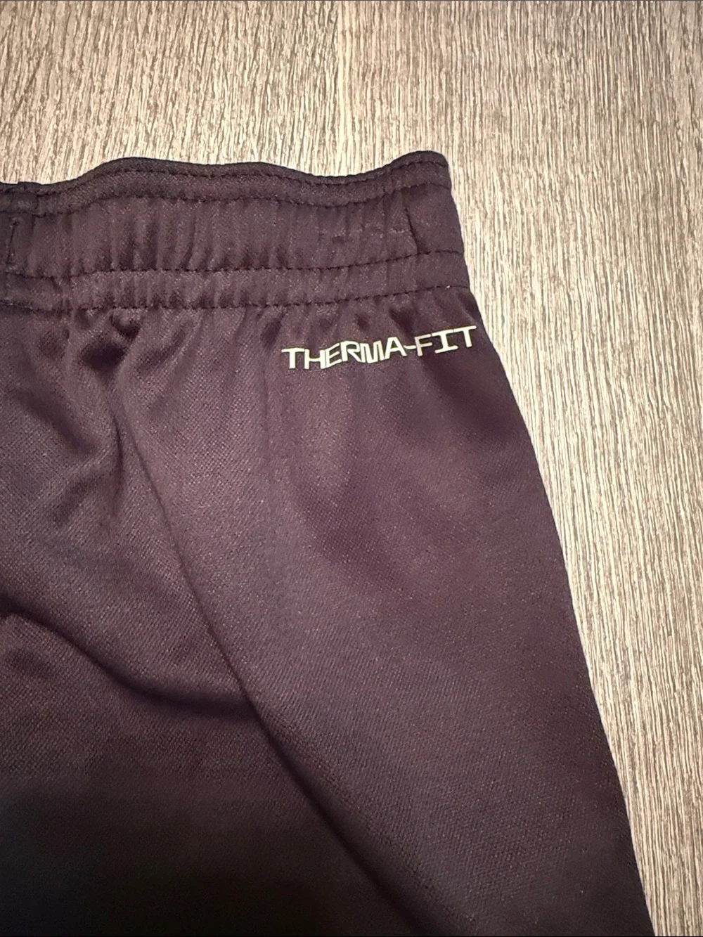 Nike Black Kids Sweatpants with White Swoosh Graphic